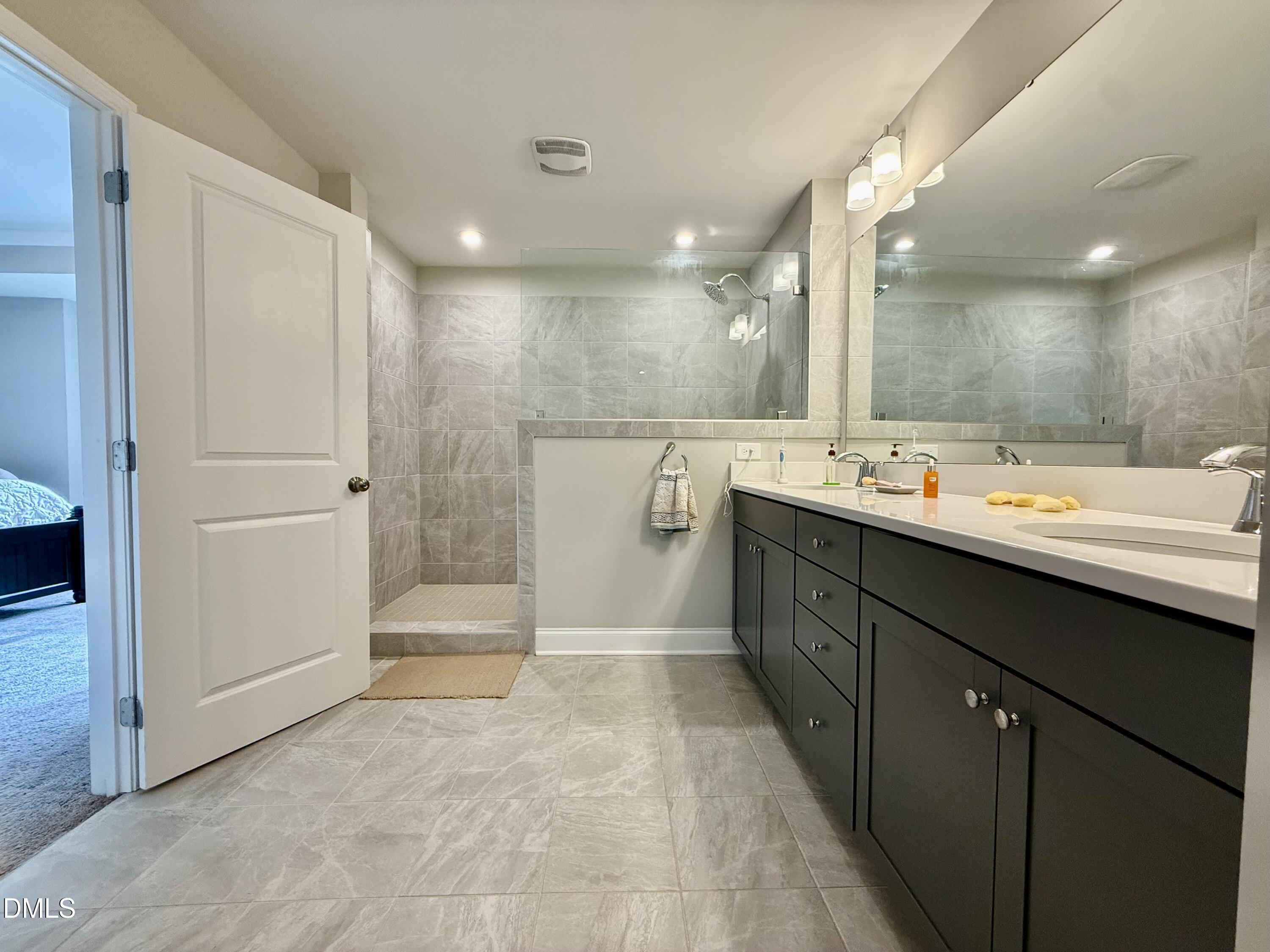 254 Deardom Way Chapel Hill, NC 27516 - Photo 11 of 21 a bathroom with a sink a toilet and shower