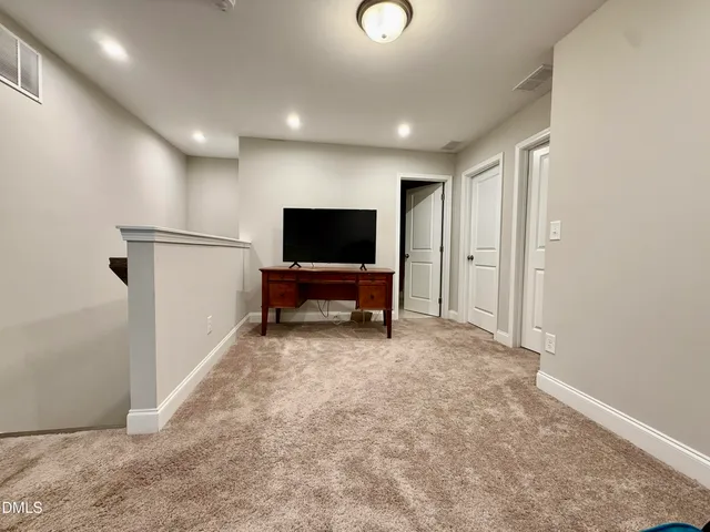 a view of a livingroom with furniture