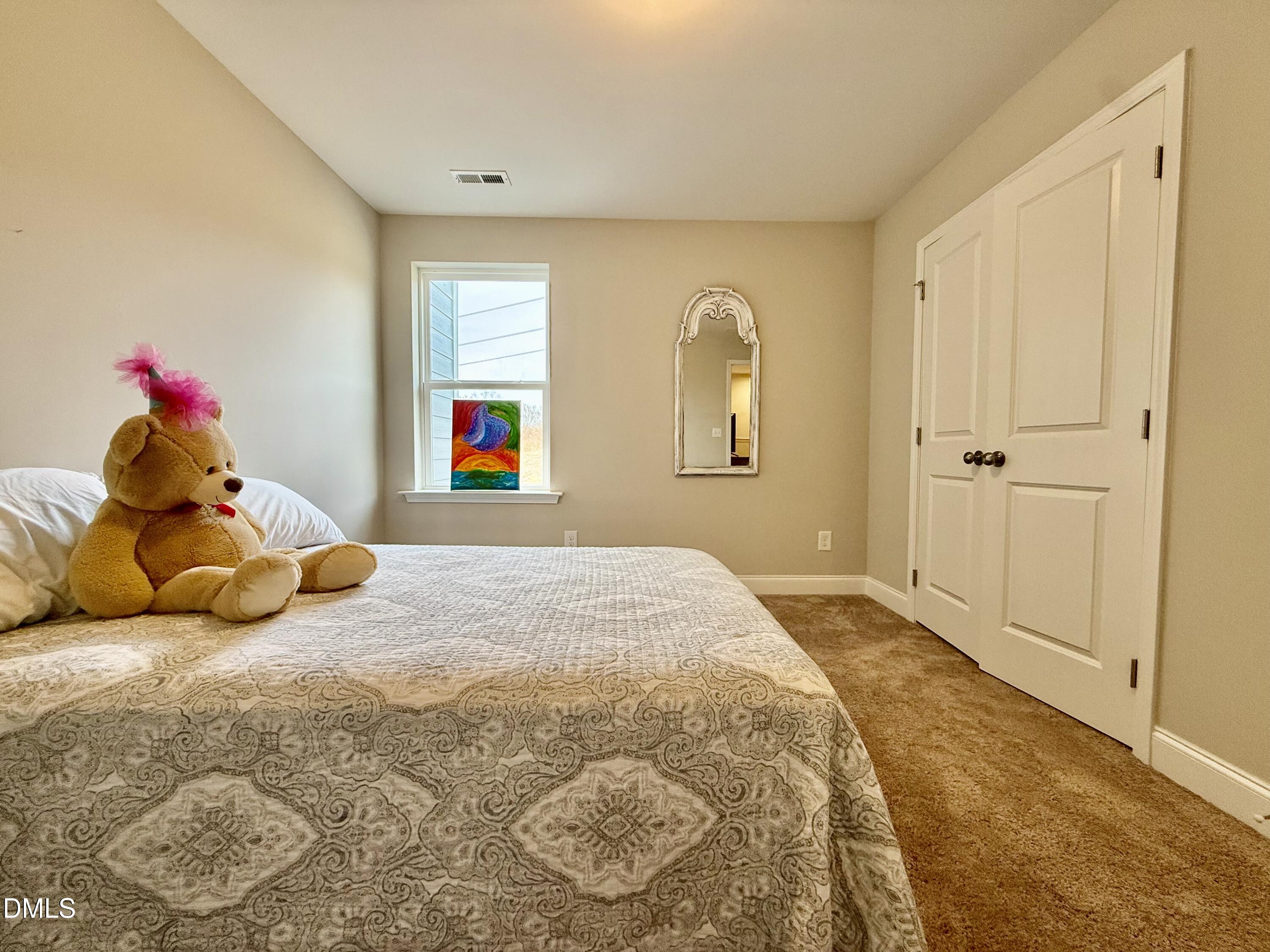 254 Deardom Way Chapel Hill, NC 27516 - Photo 18 of 21 a bed room with a bed and a window