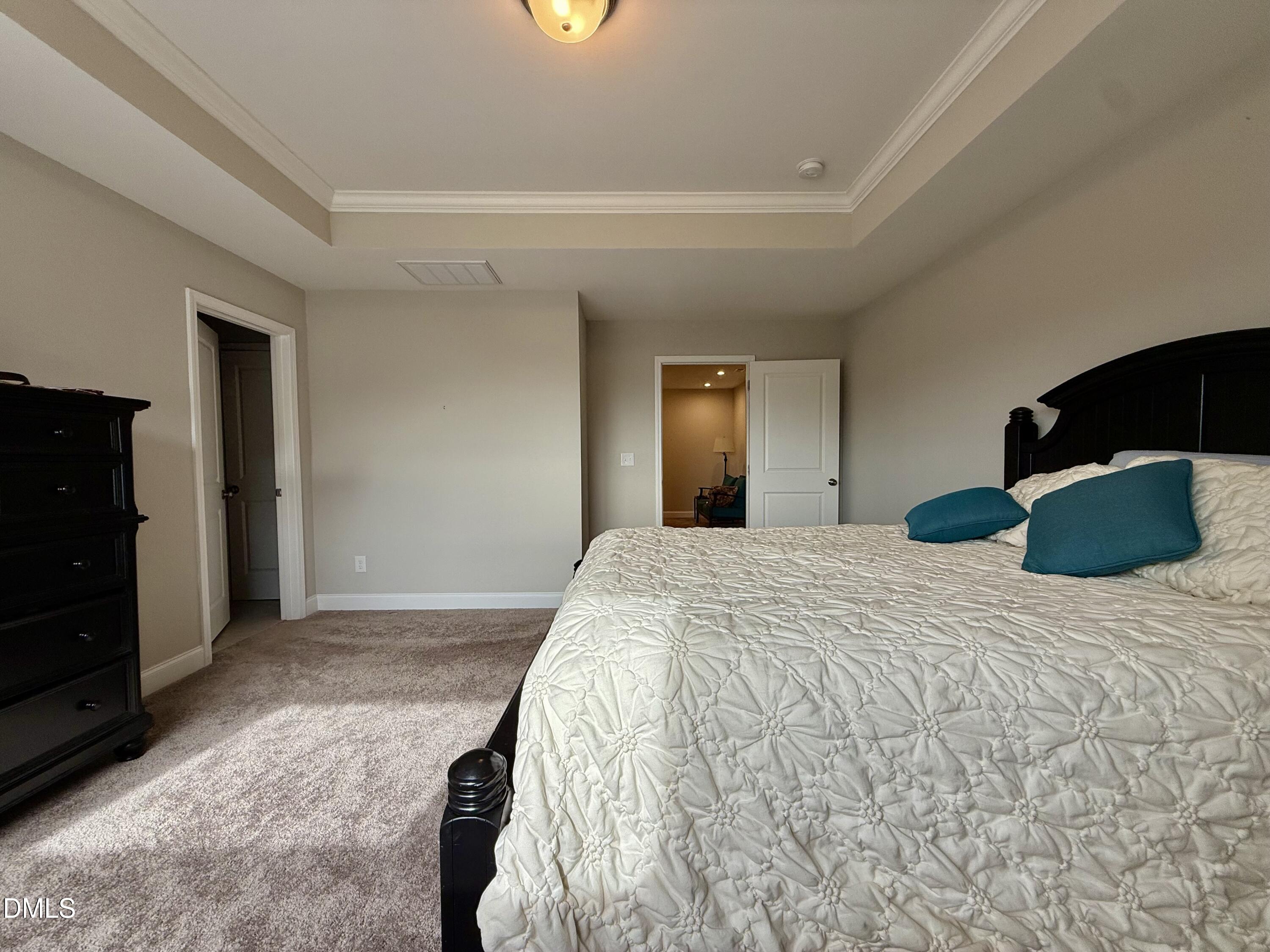 254 Deardom Way Chapel Hill, NC 27516 - Photo 10 of 21 a bedroom with a bed and closet