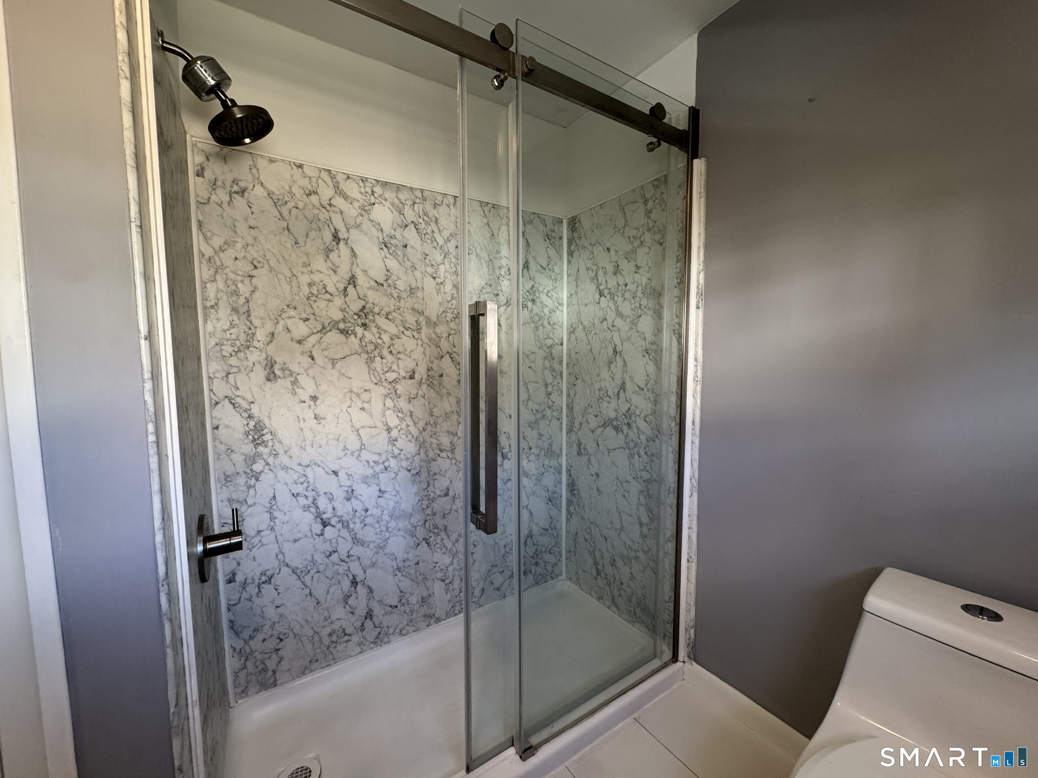 310 Lestertown Road Groton, CT 06340 - Photo 29 of 31 a bathroom with a shower and toilet