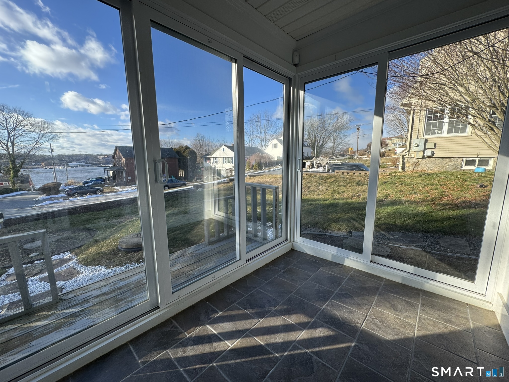 310 Lestertown Road Groton, CT 06340 - Photo 30 of 31 a view of a glass door and the floor to ceiling window