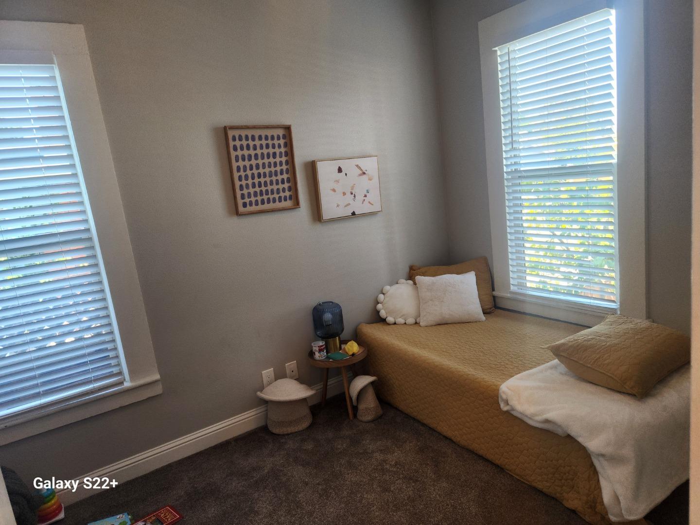 1186 Third Street Monterey, CA 93940 - Photo 11 of 24 a bedroom with a bed and a window