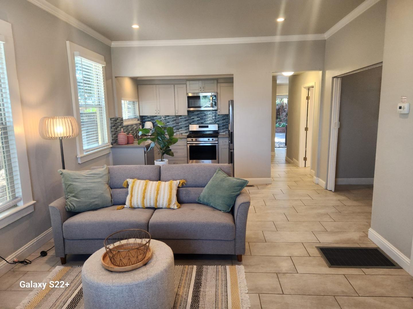 1186 Third Street Monterey, CA 93940 - Photo 4 of 24 a living room with furniture and a couch