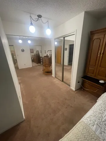 a view of a hallway with workspace