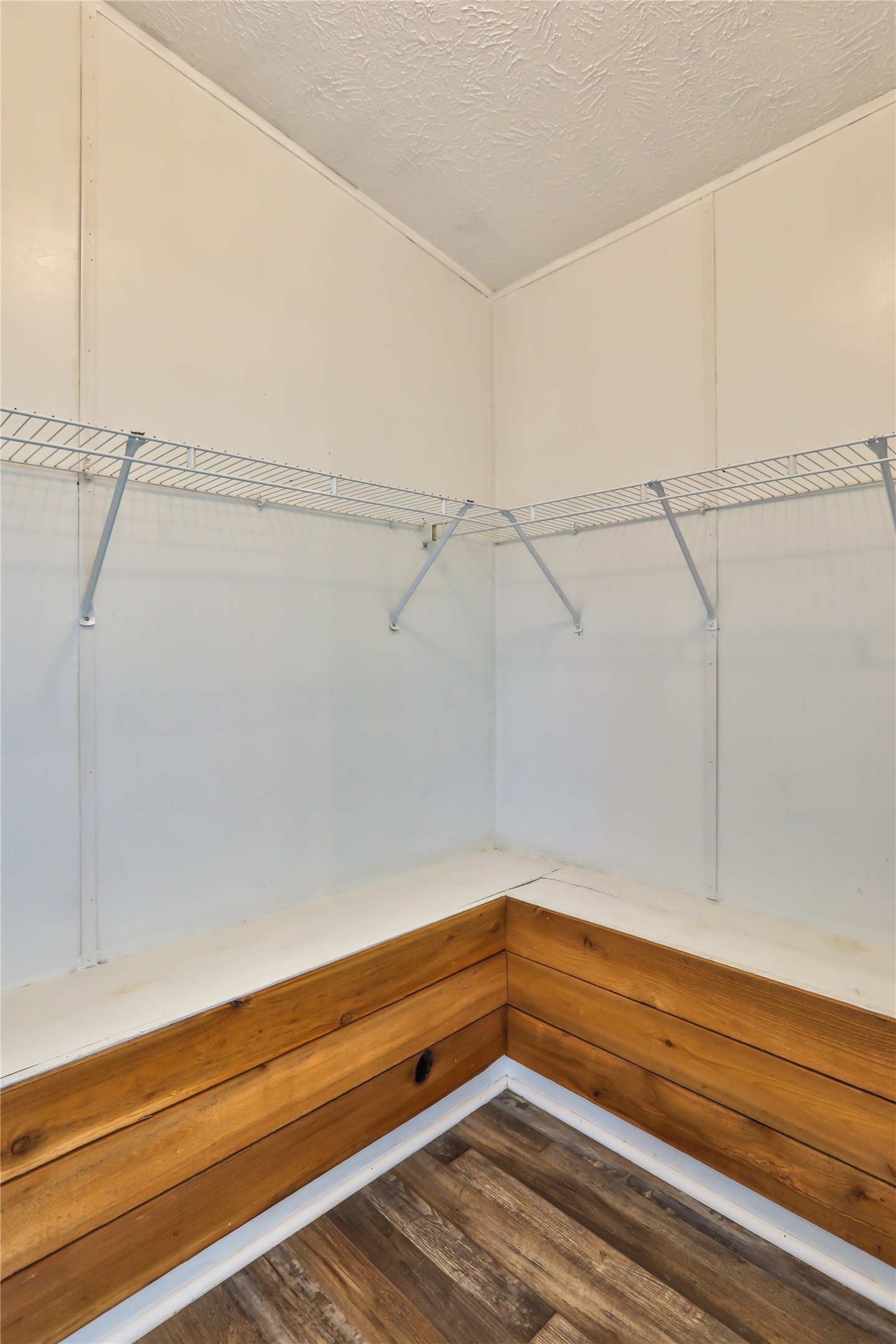 172 Kid Ranch Lane San Marcos, TX 78666 - Photo 14 of 29 Walk in closet with dark wood-type flooring