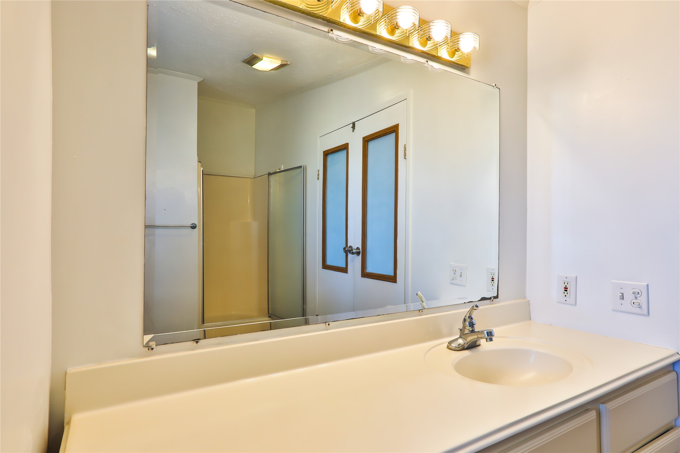172 Kid Ranch Lane San Marcos, TX 78666 - Photo 25 of 29 Bathroom featuring vanity and a shower