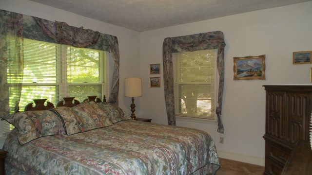 3585 Forrest Road Columbus, GA 31907 - Photo 17 of 21 a bedroom with a bed and a window