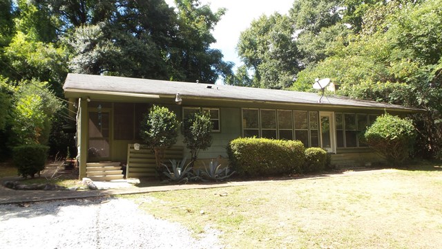 3585 Forrest Road Columbus, GA 31907 - Photo 4 of 21 a front view of a house with a yard