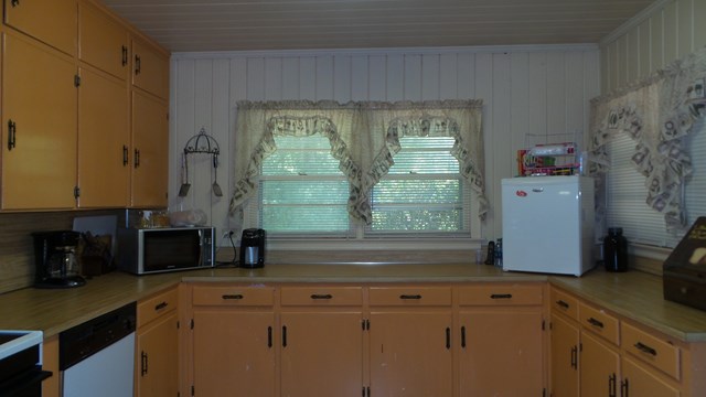 3585 Forrest Road Columbus, GA 31907 - Photo 6 of 21 a bathroom with a bathtub and a window