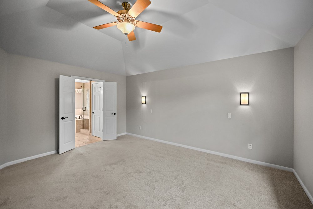 2823 Lantana Ridge Drive Austin, TX 78732 - Photo 18 of 34 a view of an empty room with a window