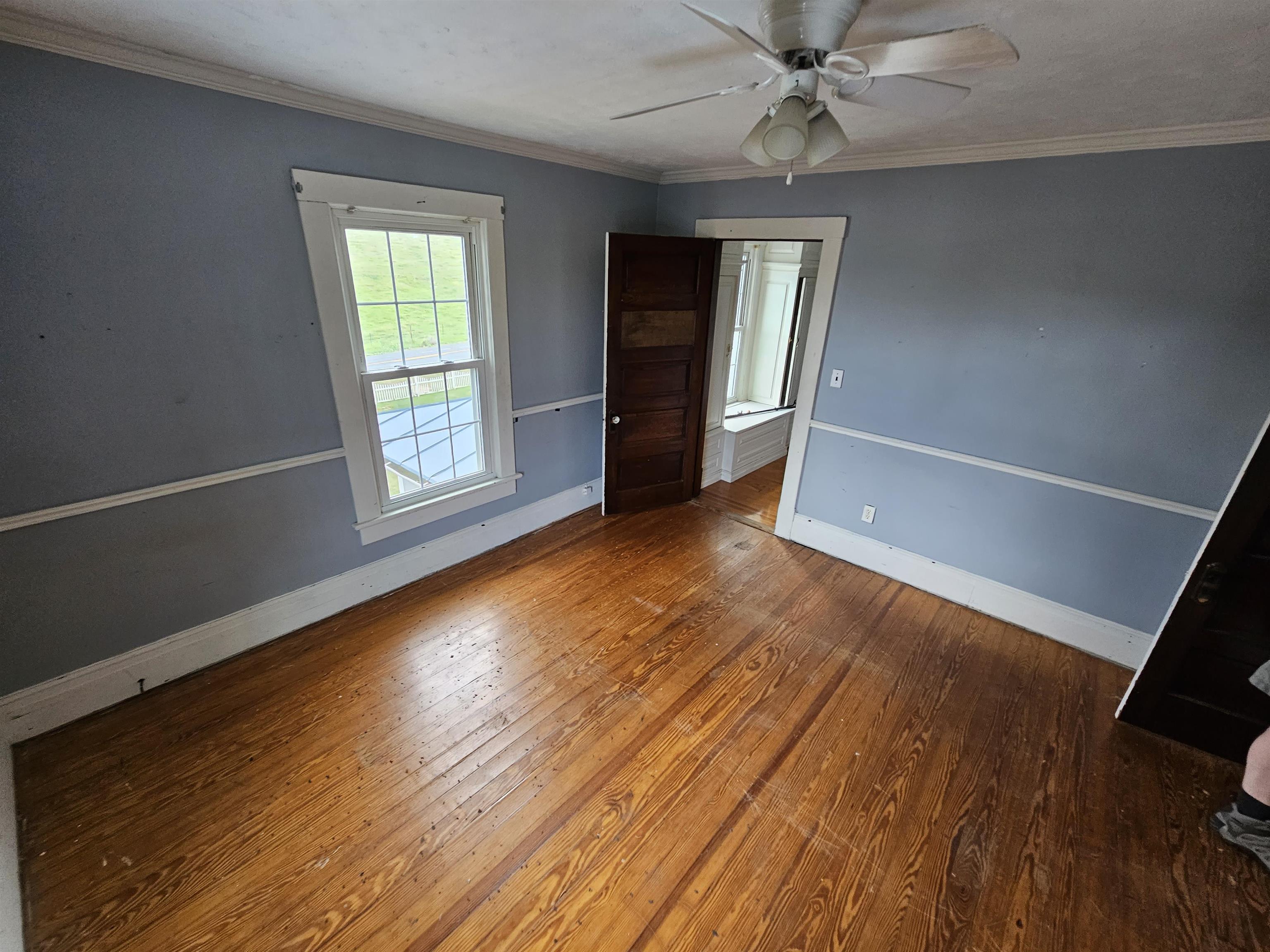 2964 Spring Hill Road Staunton, VA 24401 - Photo 43 of 71 an empty room with wooden floor and windows