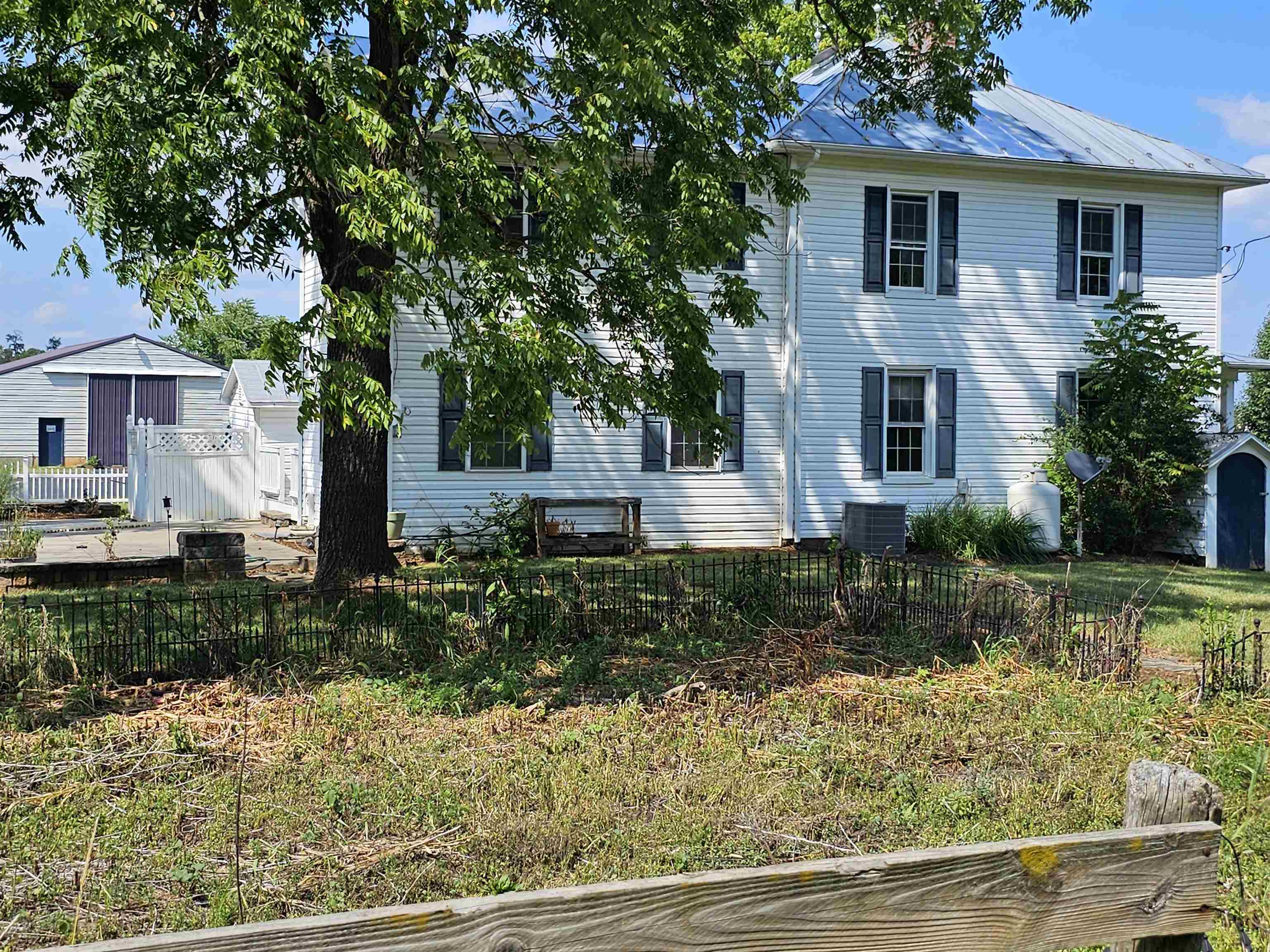 2964 Spring Hill Road Staunton, VA 24401 - Photo 8 of 71 a front view of a house with garden