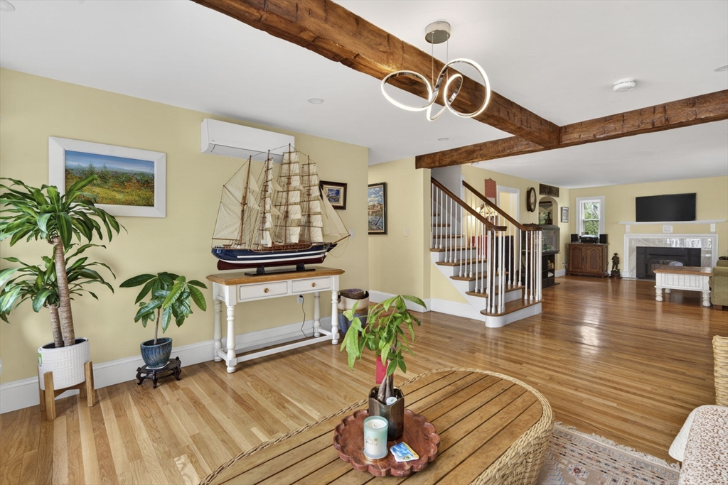 229 Parkerville Road Southborough, MA 01772 - Photo 31 of 38 a living room with furniture and a wooden floor