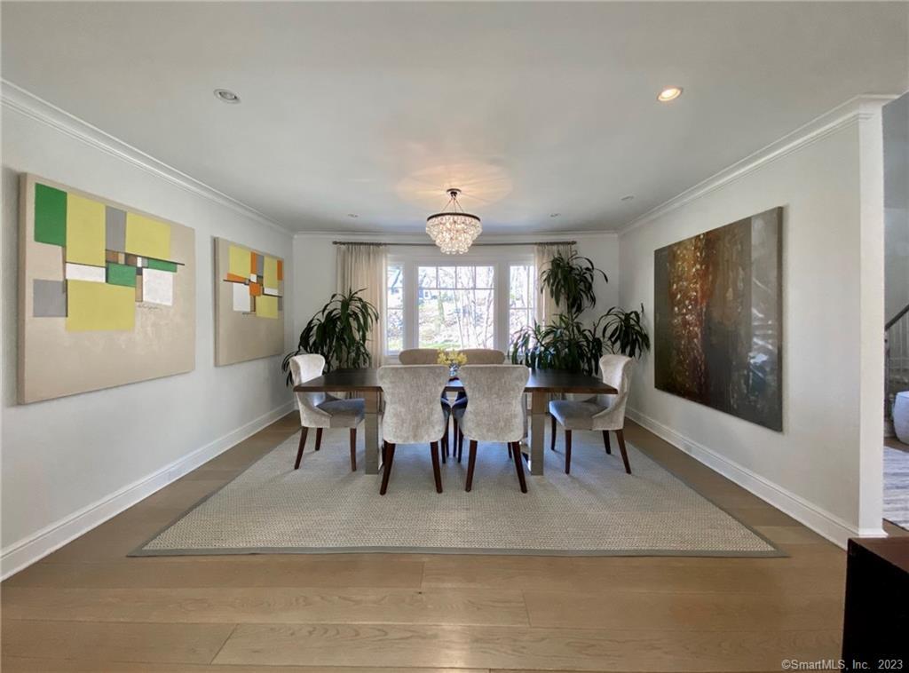 7 Whaling Road Darien, CT 06820 - Photo 5 of 34 a view of a dining room with furniture window and wooden floor