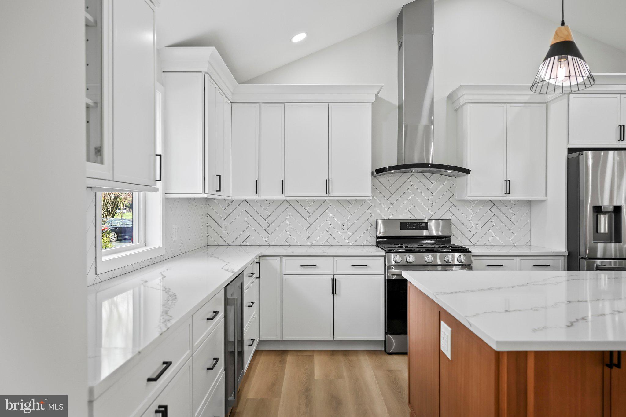 428 South Post Road Princeton Junction, NJ 08550 - Photo 8 of 68 a kitchen with stainless steel appliances granite countertop a sink stove and refrigerator