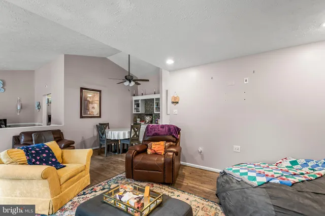 a living room with furniture and a couch