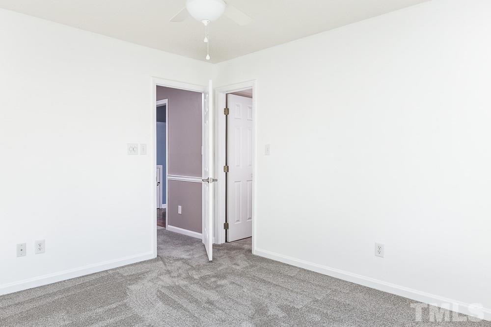 12212 Amoretto Way Raleigh, NC 27613 - Photo 21 of 30 a view of an empty room