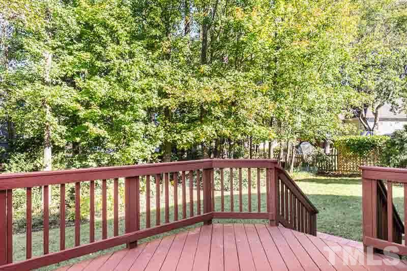 12212 Amoretto Way Raleigh, NC 27613 - Photo 26 of 30 a view of balcony with wooden floor