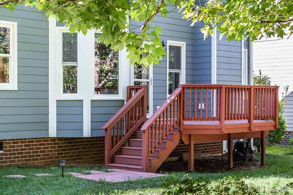 12212 Amoretto Way Raleigh, NC 27613 - Photo 27 of 30 a view of a wooden deck with a chairs