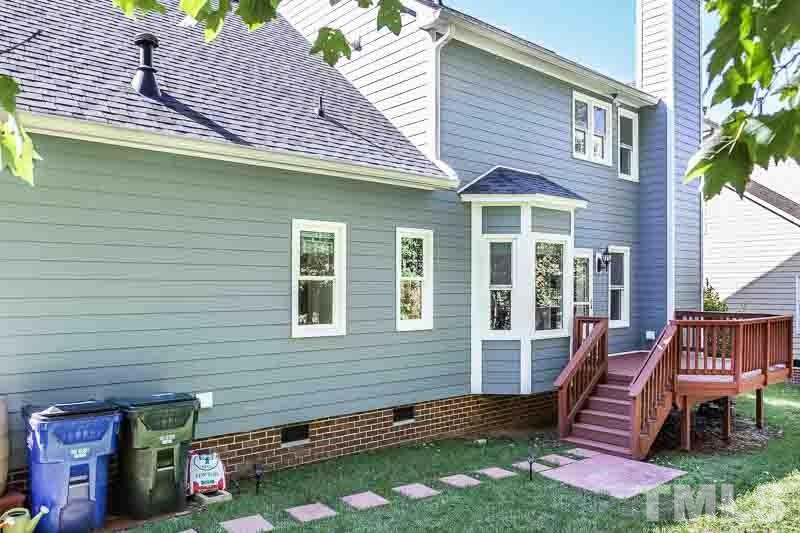 12212 Amoretto Way Raleigh, NC 27613 - Photo 28 of 30 a front view of a house with a yard