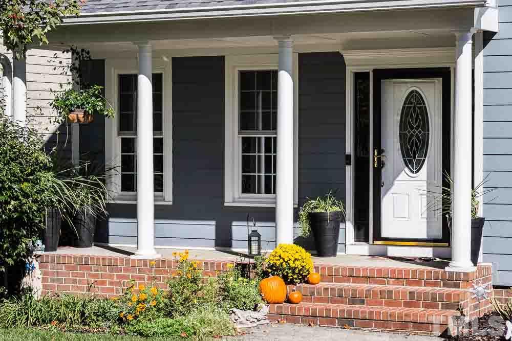 12212 Amoretto Way Raleigh, NC 27613 - Photo 30 of 30 a front view of a house with a yard