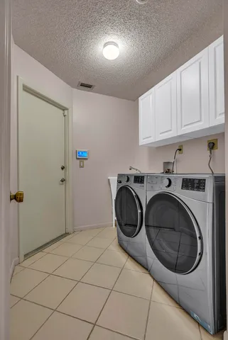 a view of a swimming pool with a yard