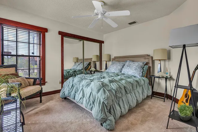 a kitchen with stainless steel appliances granite countertop a refrigerator and a stove