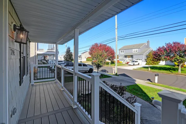 a view of a porch and garden