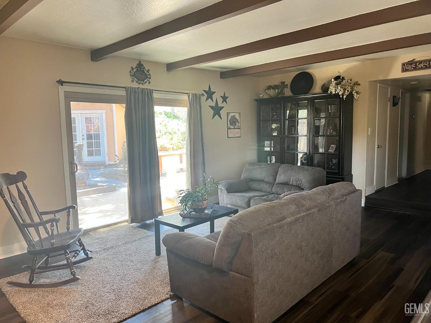 Undisclosed Address Tehachapi, CA 93561 - Photo 17 of 22 a living room with furniture and wooden floor