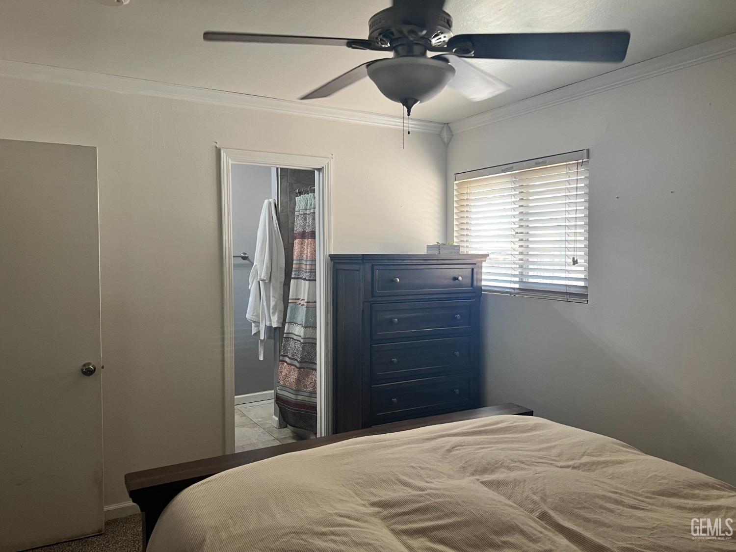 Undisclosed Address Tehachapi, CA 93561 - Photo 22 of 22 a bedroom with a bed and a dresser