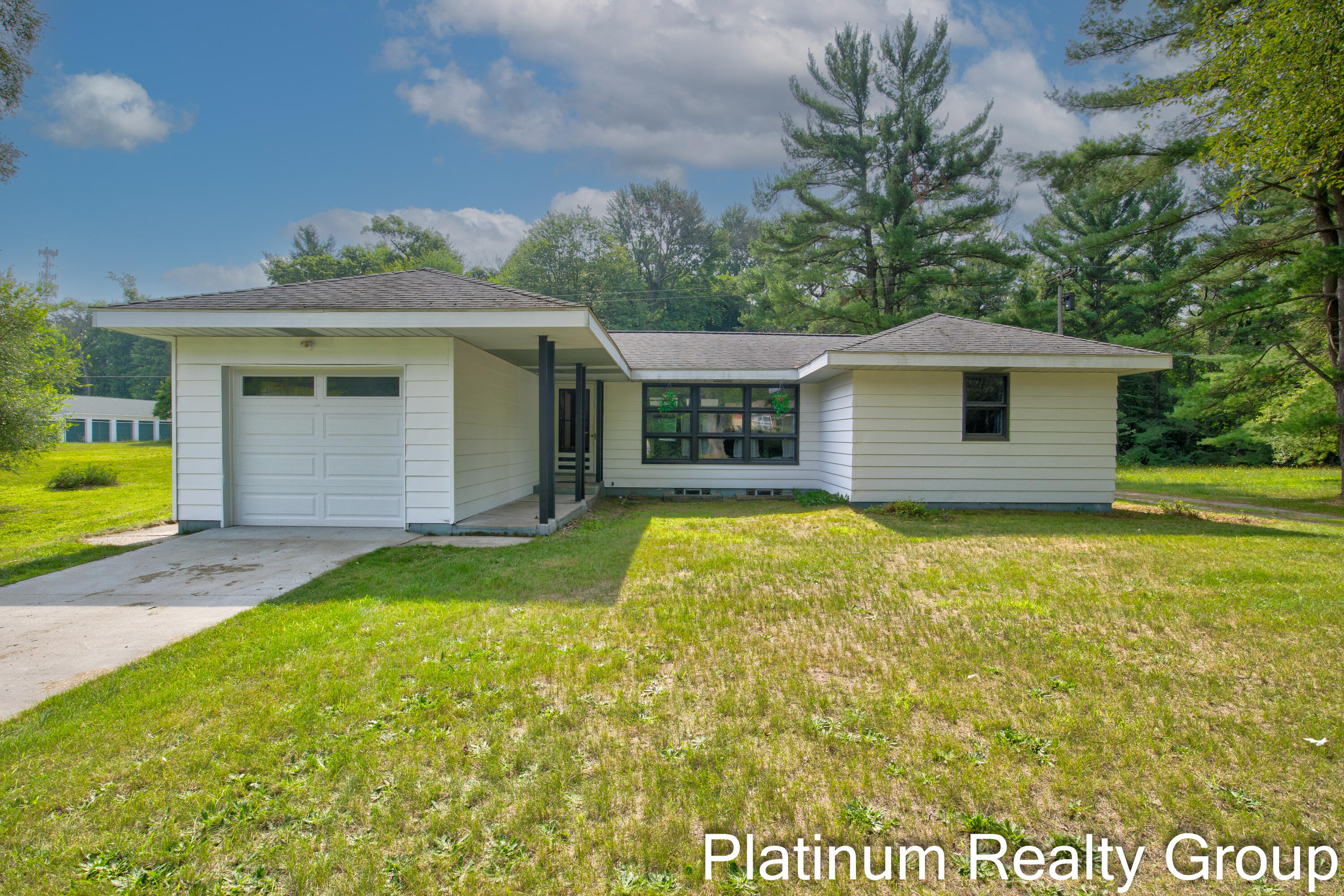 8280 Holton Road Holton, MI 49425 - Photo 1 of 34 Front