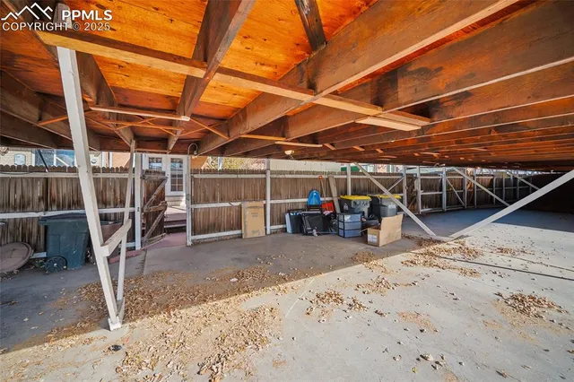 an outdoor space with pool and furniture