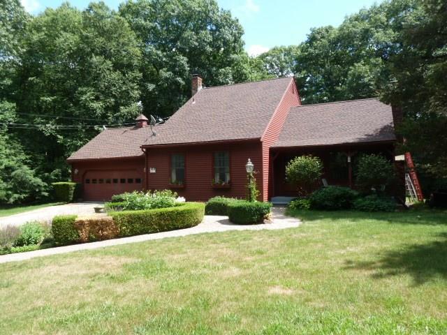 81 Hayden Road Harwinton, CT 06791 - Photo 1 of 1 a front view of a house with a yard and garage