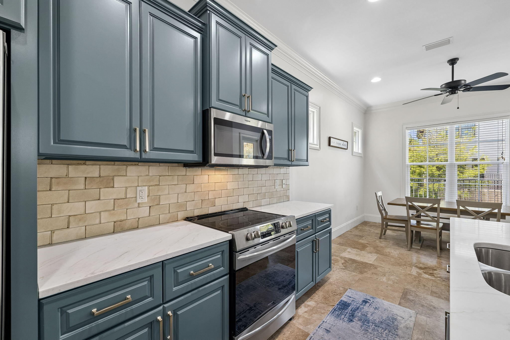1973 Baytowne Loop Miramar Beach, FL 32550 - Photo 10 of 38 a kitchen with a stove and a microwave