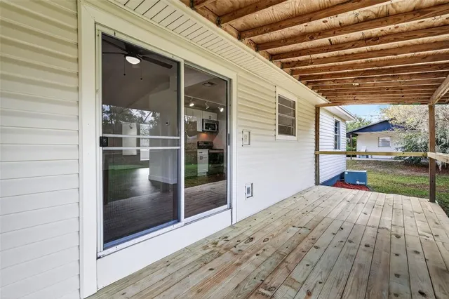a porch with seating space