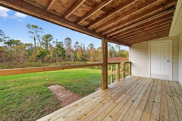 a view of backyard with green space
