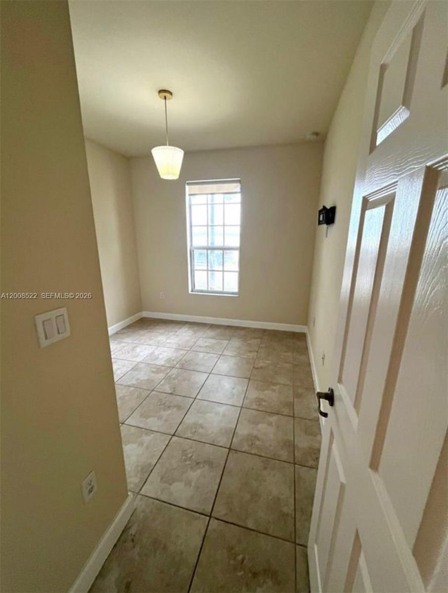 9401 Southwest 172nd Avenue, Unit 9401 Miami, FL 33196 - Photo 14 of 34 a view of entryway with front door