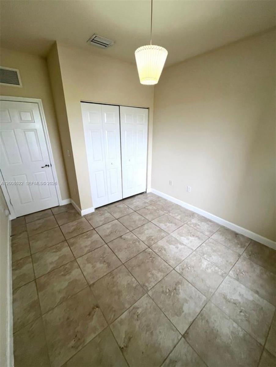 9401 Southwest 172nd Avenue, Unit 9401 Miami, FL 33196 - Photo 15 of 34 a view of empty room