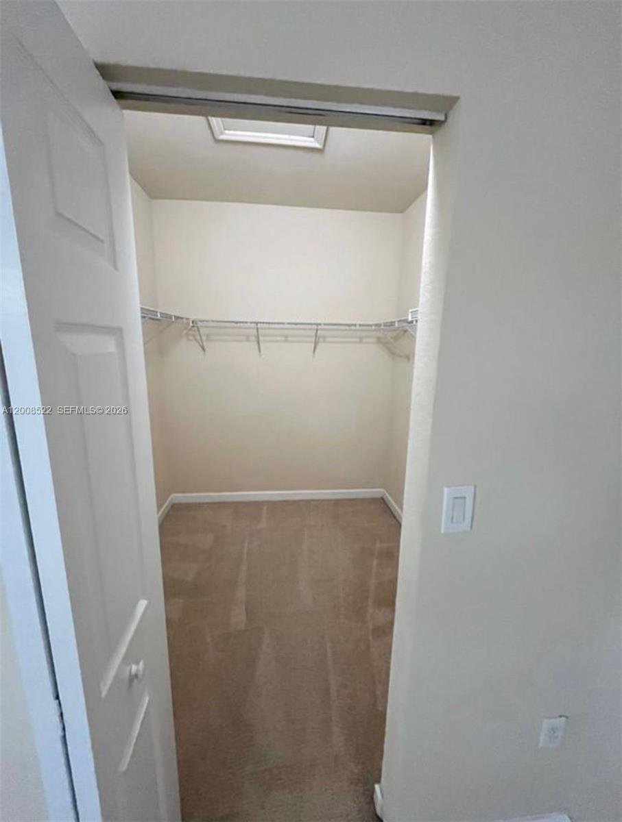 9401 Southwest 172nd Avenue, Unit 9401 Miami, FL 33196 - Photo 23 of 34 a close view of a refrigerator in a kitchen