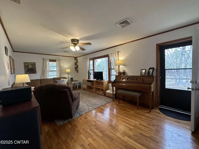 a kitchen with refrigerator and window