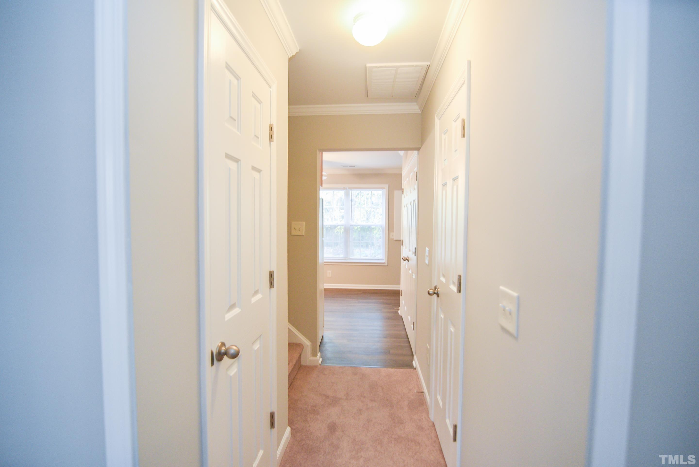 69 Red Lane Raleigh, NC 27606 - Photo 8 of 16 a view of a bathroom from a hallway