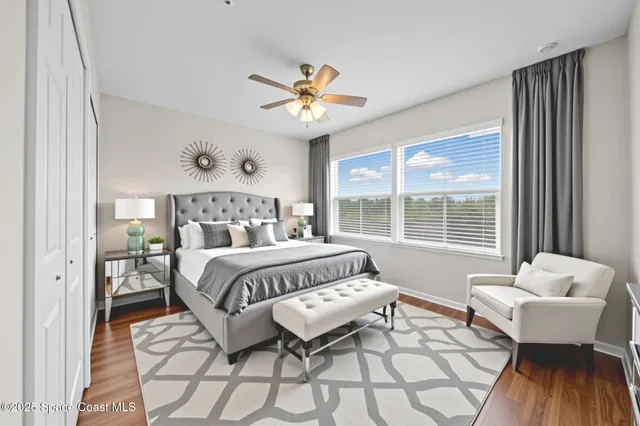 outdoor view of a swimming pool and outdoor seating