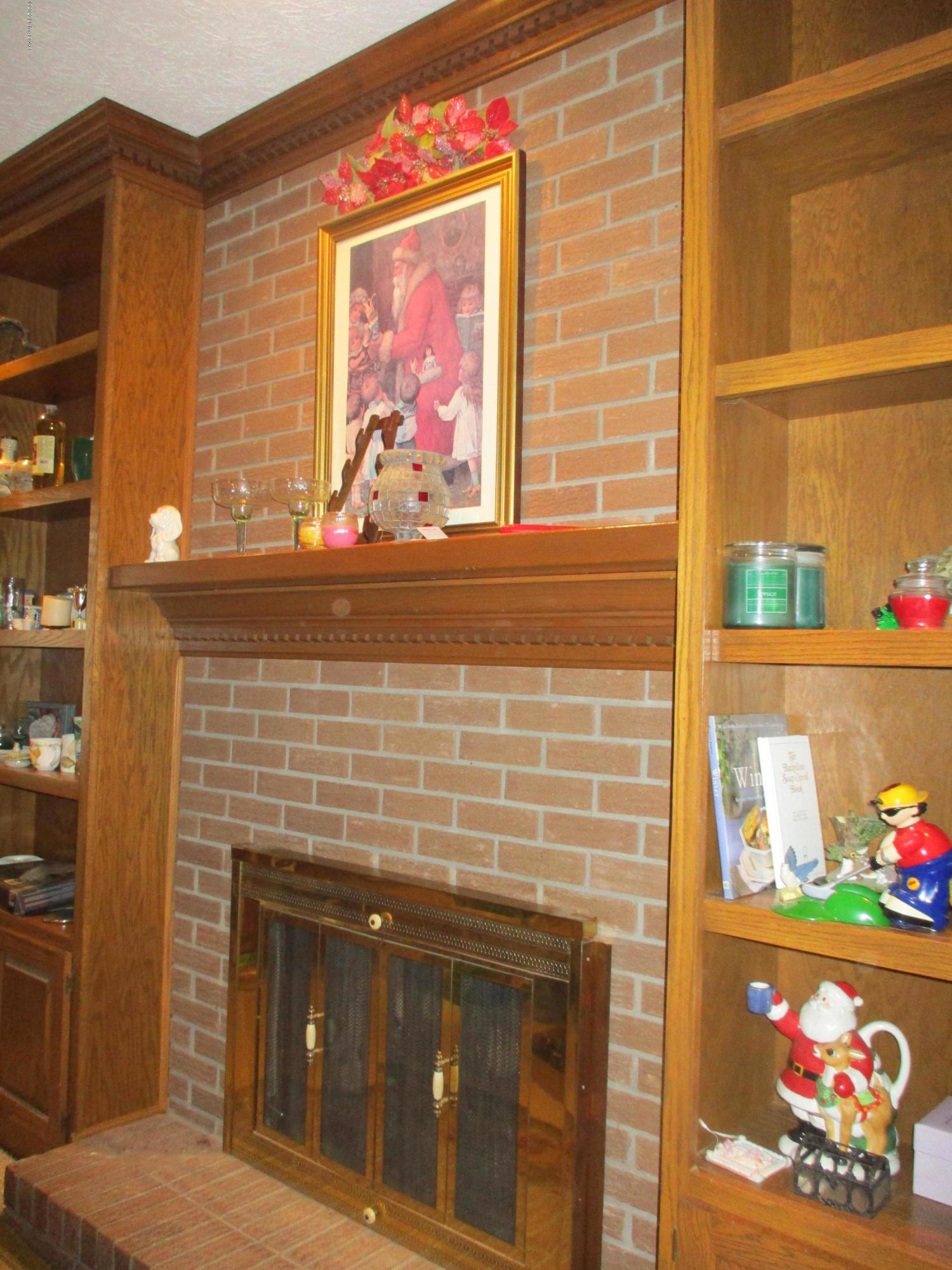 861 Castlerock Drive Shepherdsville, KY 40165 - Photo 18 of 31 Gas Fireplace in Family Rm, Build in Shelving, Doors leading to deck, Ceiling Fan and Beams