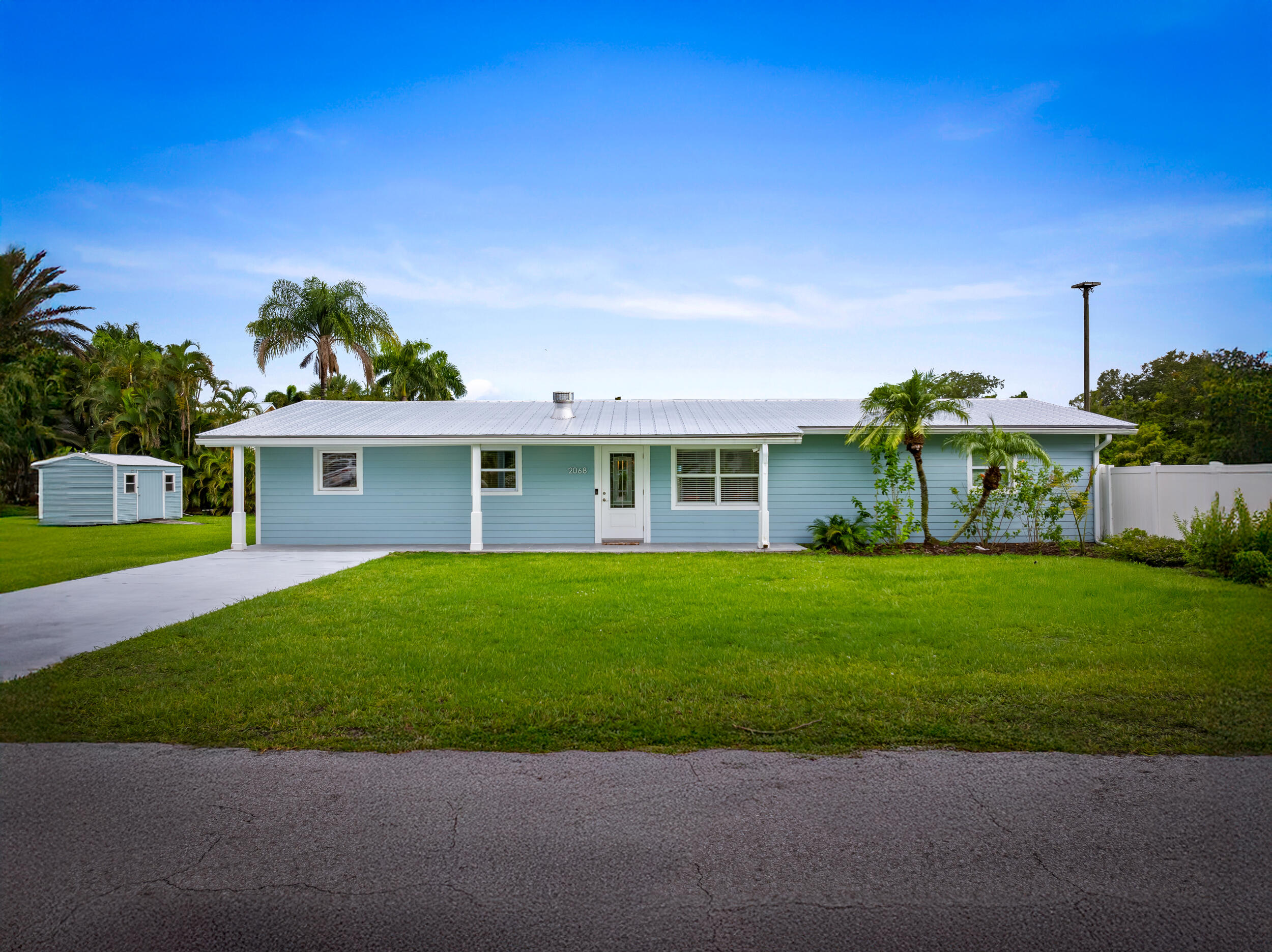 2068 Northwest Azalea Street Stuart, FL 34994 - Photo 1 of 47 1_dji_20250706151002_0681_d-edit