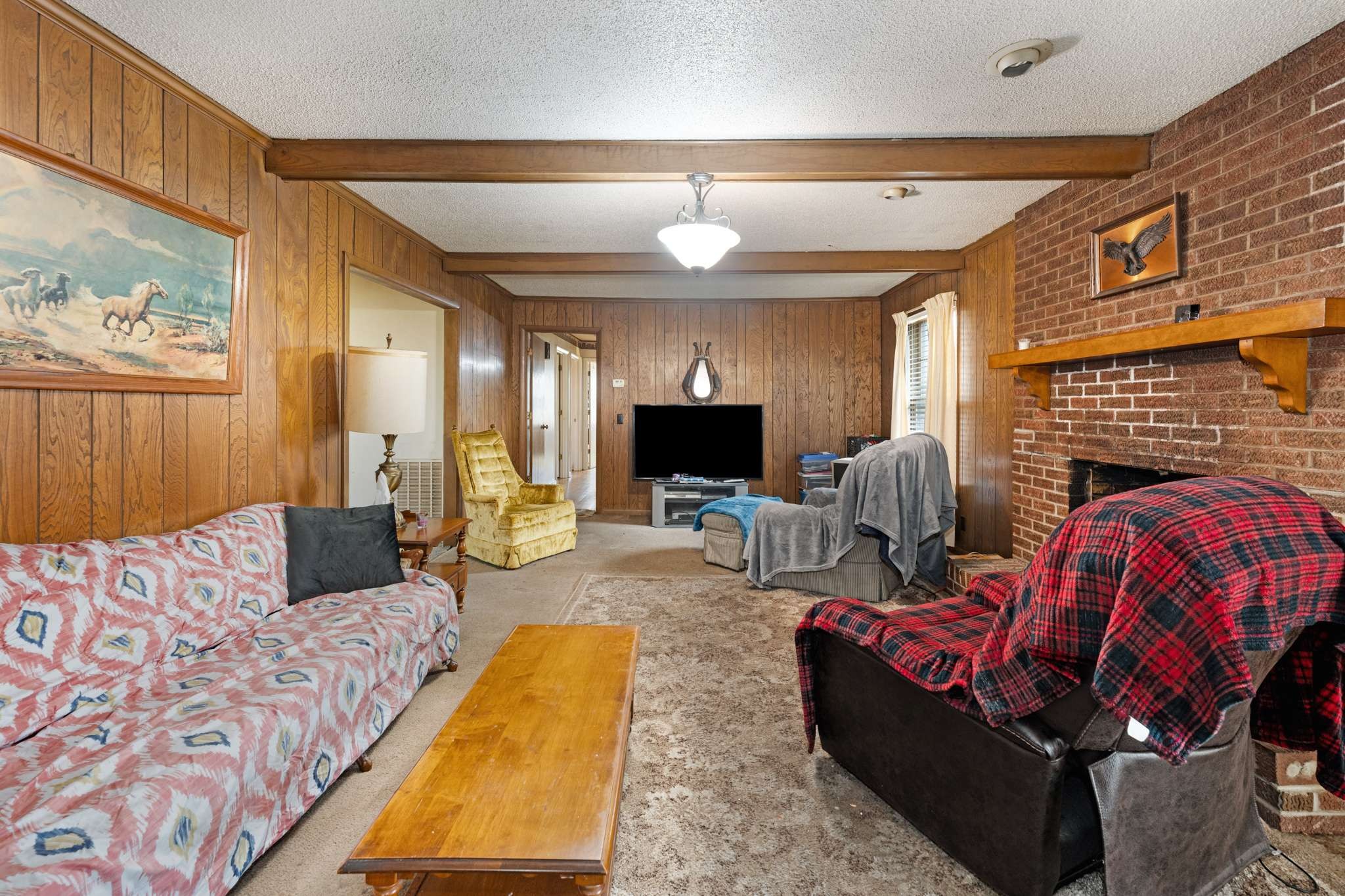 3265 Mt Tabor Road Murfreesboro, TN 37127 - Photo 11 of 30 a living room with furniture fireplace and flat screen tv