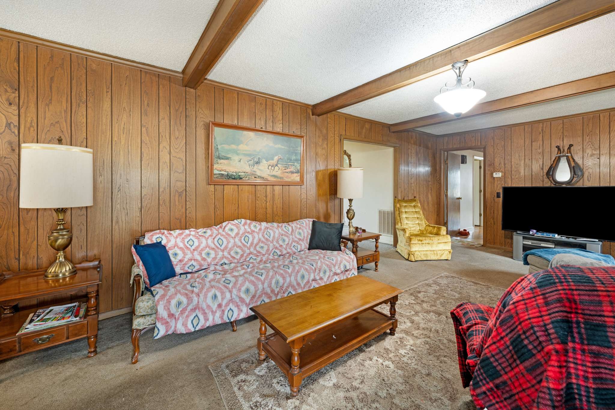 3265 Mt Tabor Road Murfreesboro, TN 37127 - Photo 12 of 30 a living room with furniture a flat screen tv and a lamp