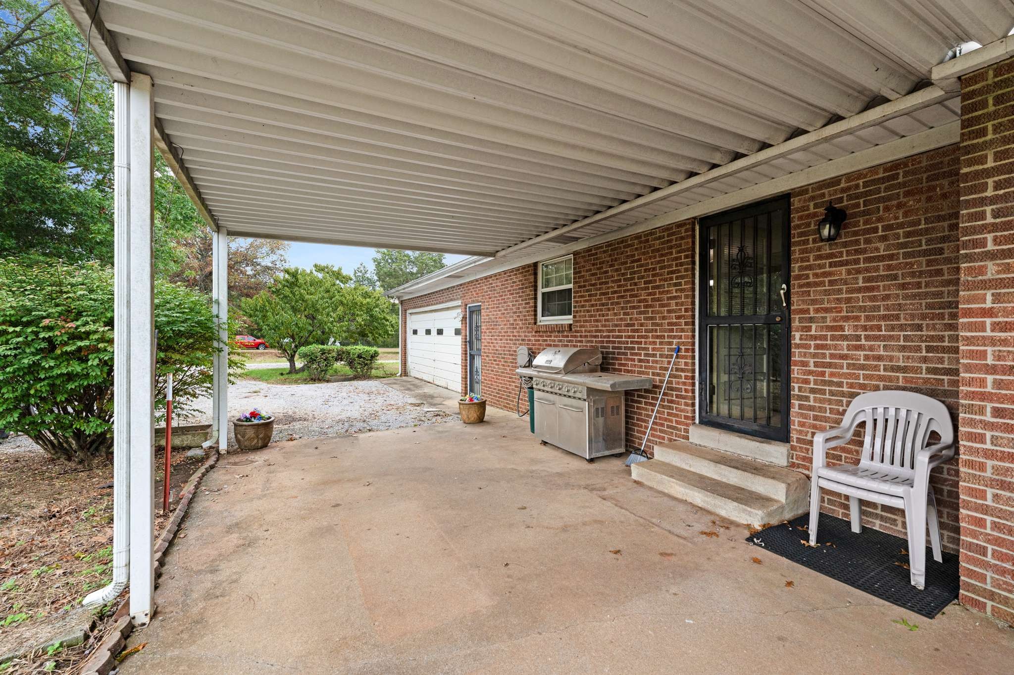 3265 Mt Tabor Road Murfreesboro, TN 37127 - Photo 21 of 30 a view of a patio with a chairs and table in the patio