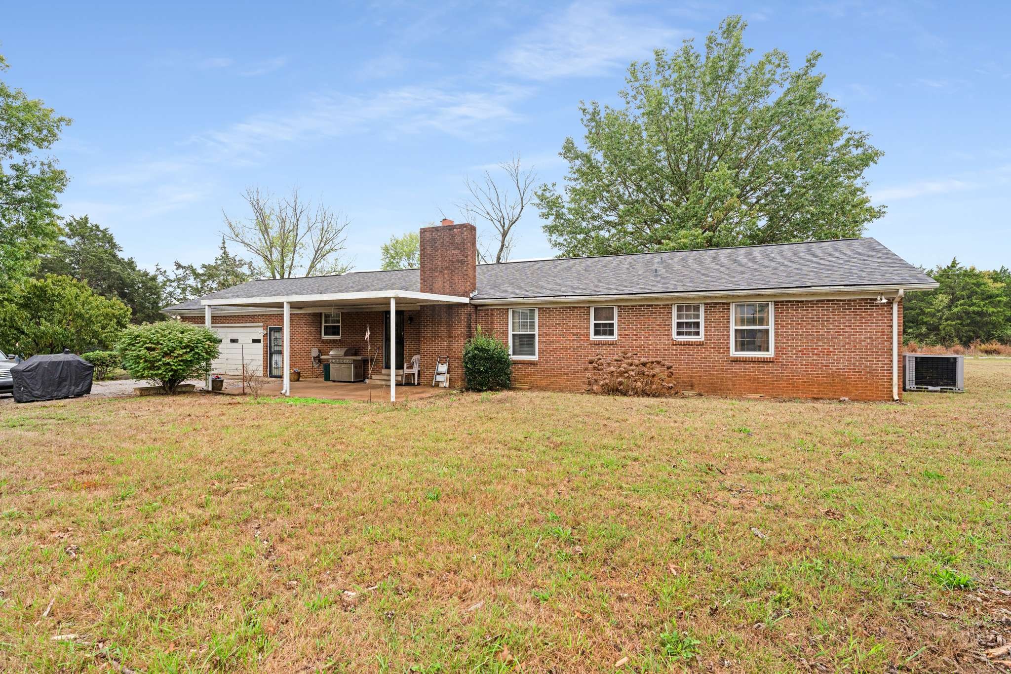 3265 Mt Tabor Road Murfreesboro, TN 37127 - Photo 23 of 30 a front view of a house with a garden