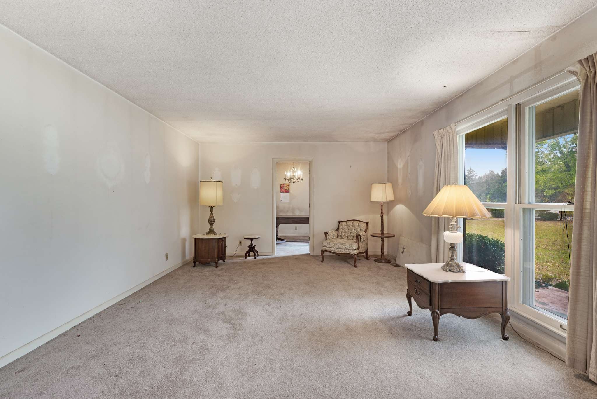 3265 Mt Tabor Road Murfreesboro, TN 37127 - Photo 9 of 30 a living room with furniture and a chandelier